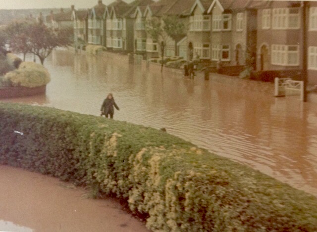 Josie Wookey returning to Bower Road during the 1968 Floods